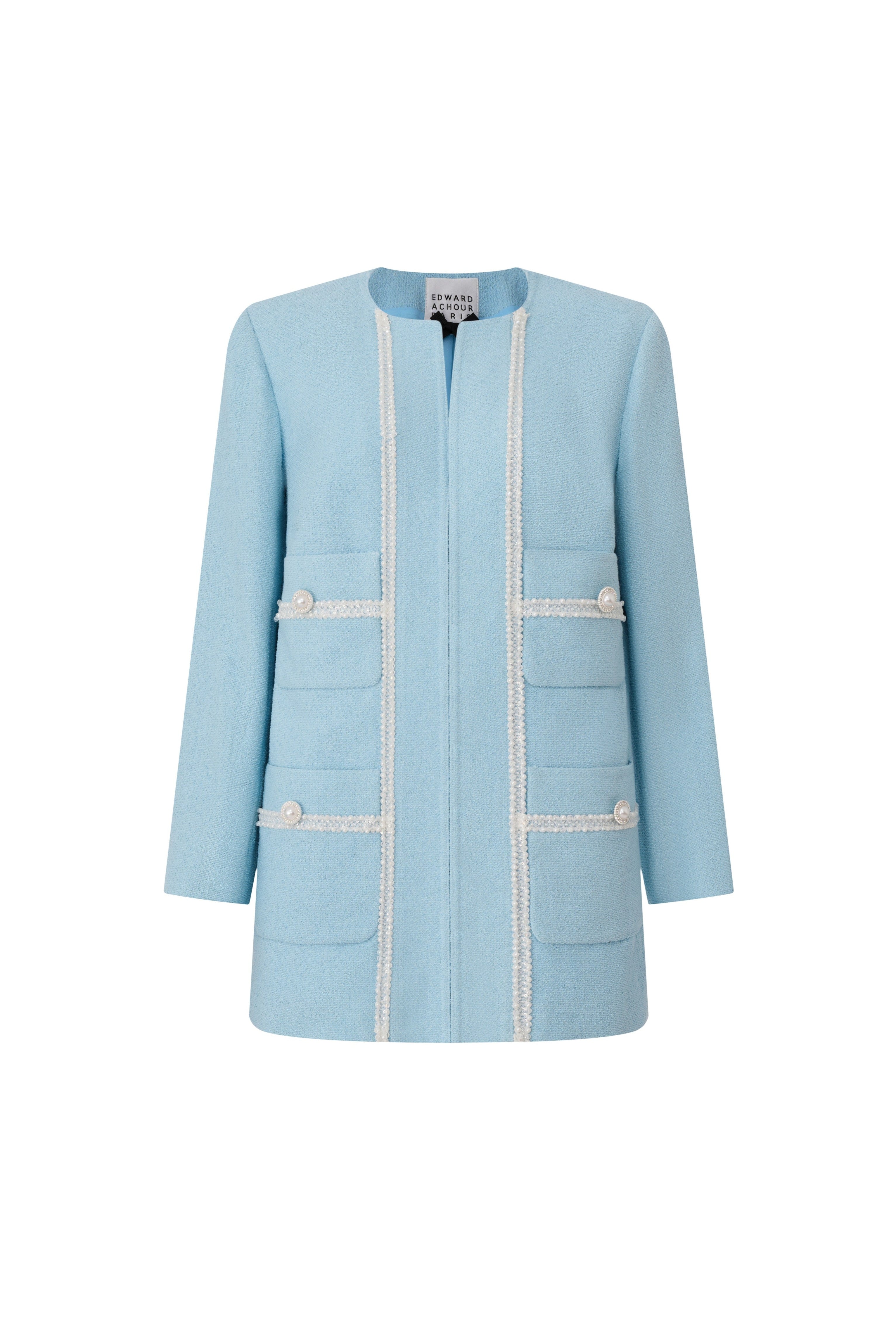 Front view of a sky blue long-line bouclé jacket with white trim and pearl button pockets by Edward Achour.