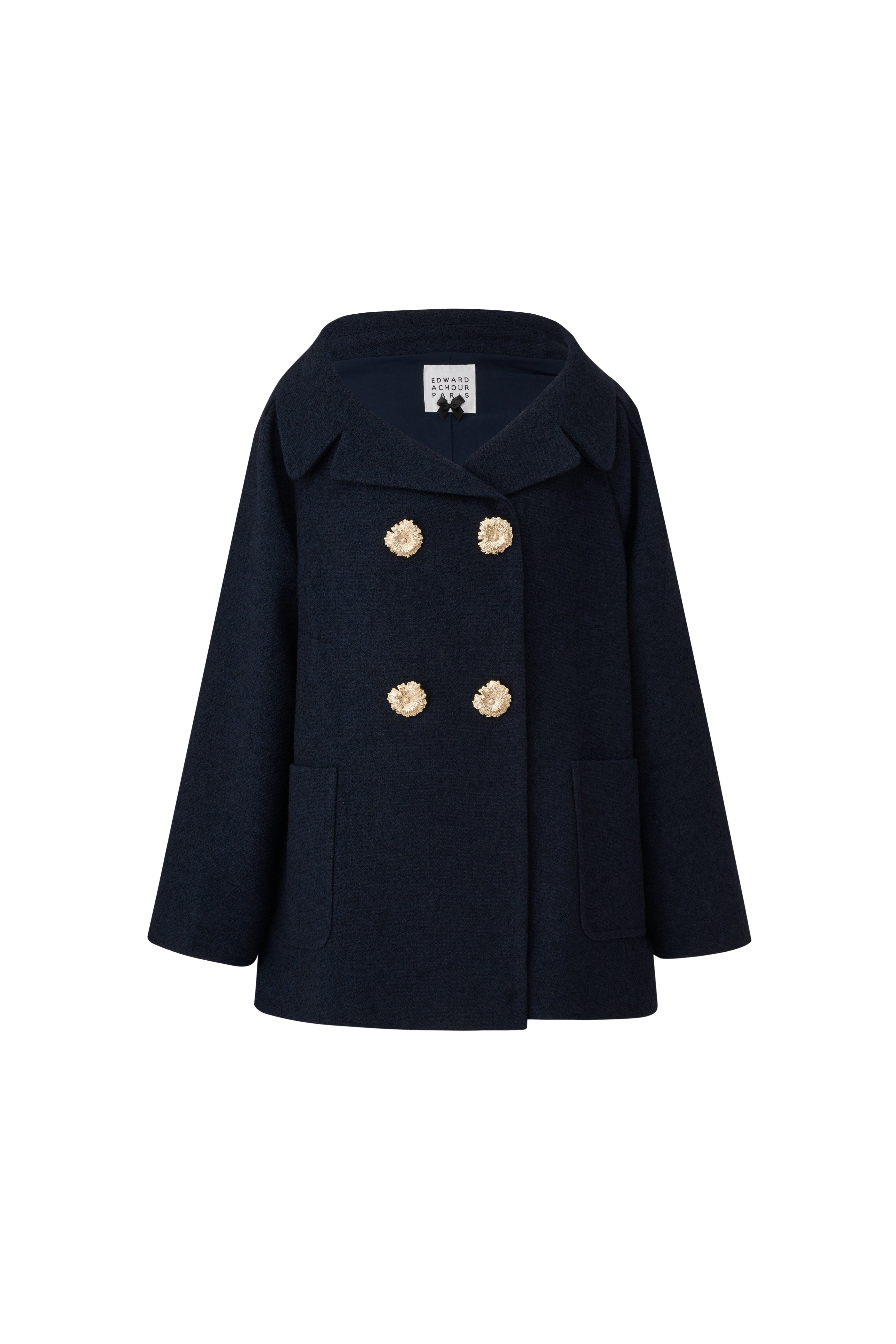 Front view of a navy blue oversized double-breasted A-line pea coat with gold buttons by Edward Achour.