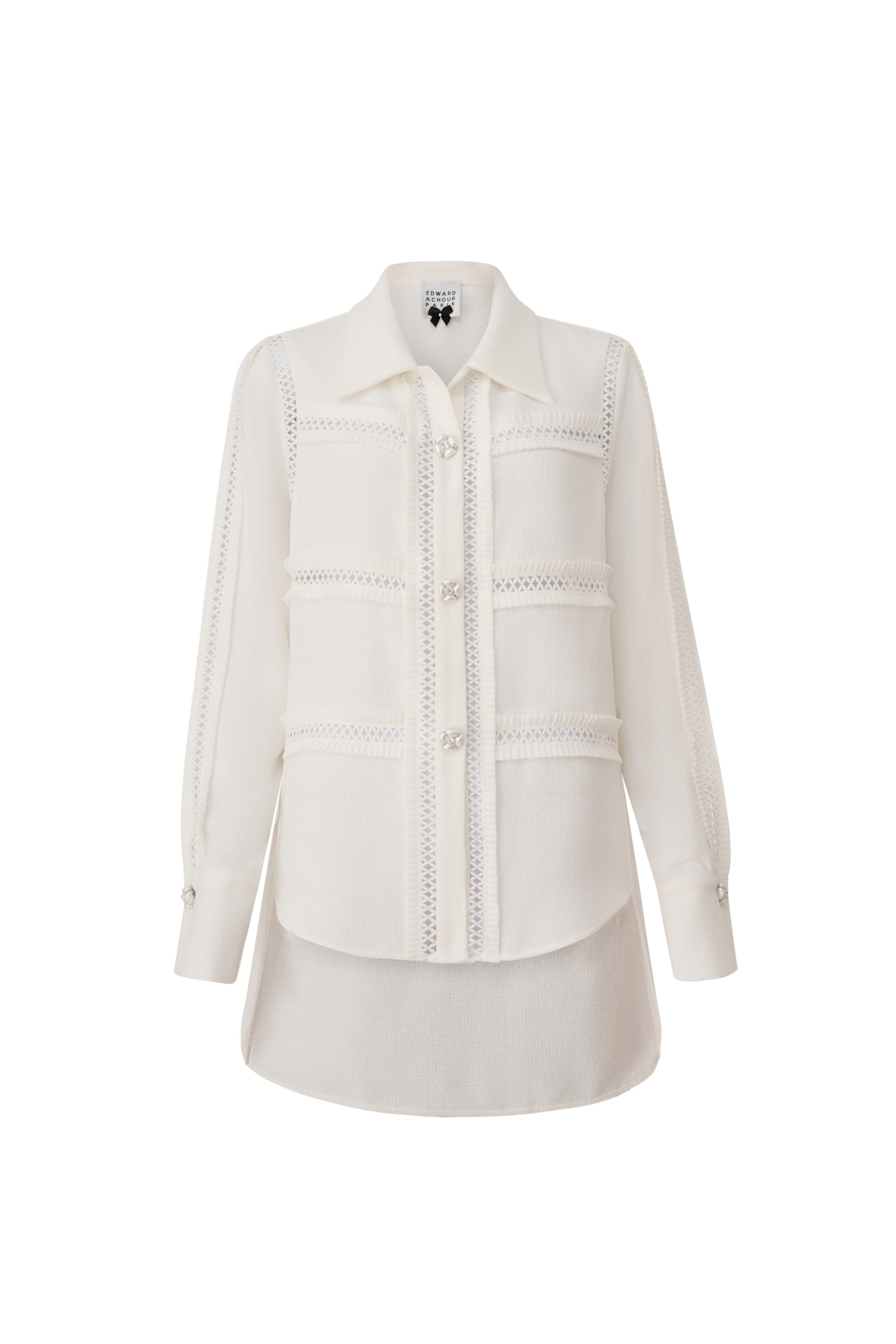 Front view of a white sheer mesh long-sleeve shirt with eyelet detailing and silver buttons by Edward Achour Paris.