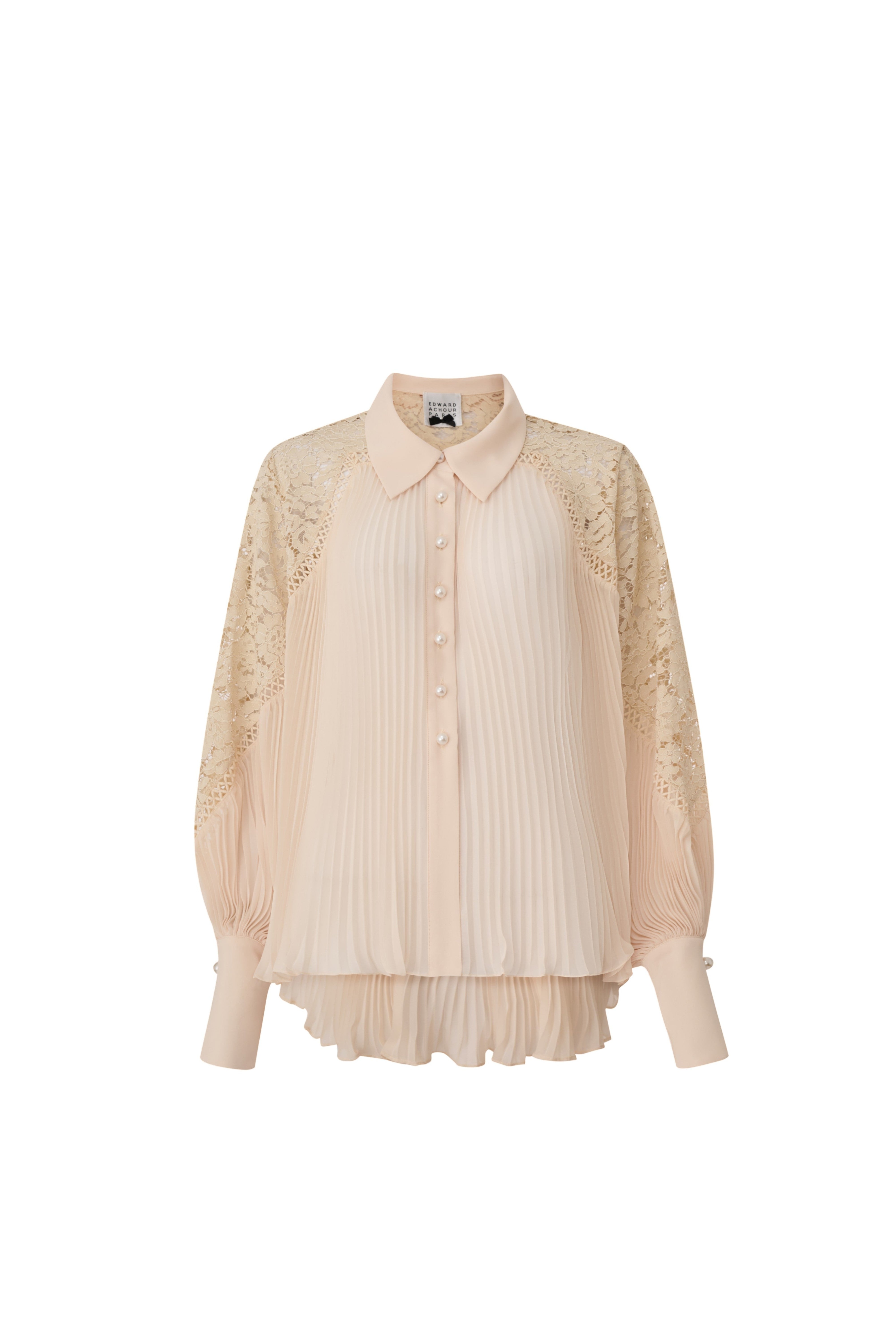 Front view of a nude pink long-sleeve blouse with vertical pleats, lace shoulders, and pearl buttons by Edward Achour Paris.