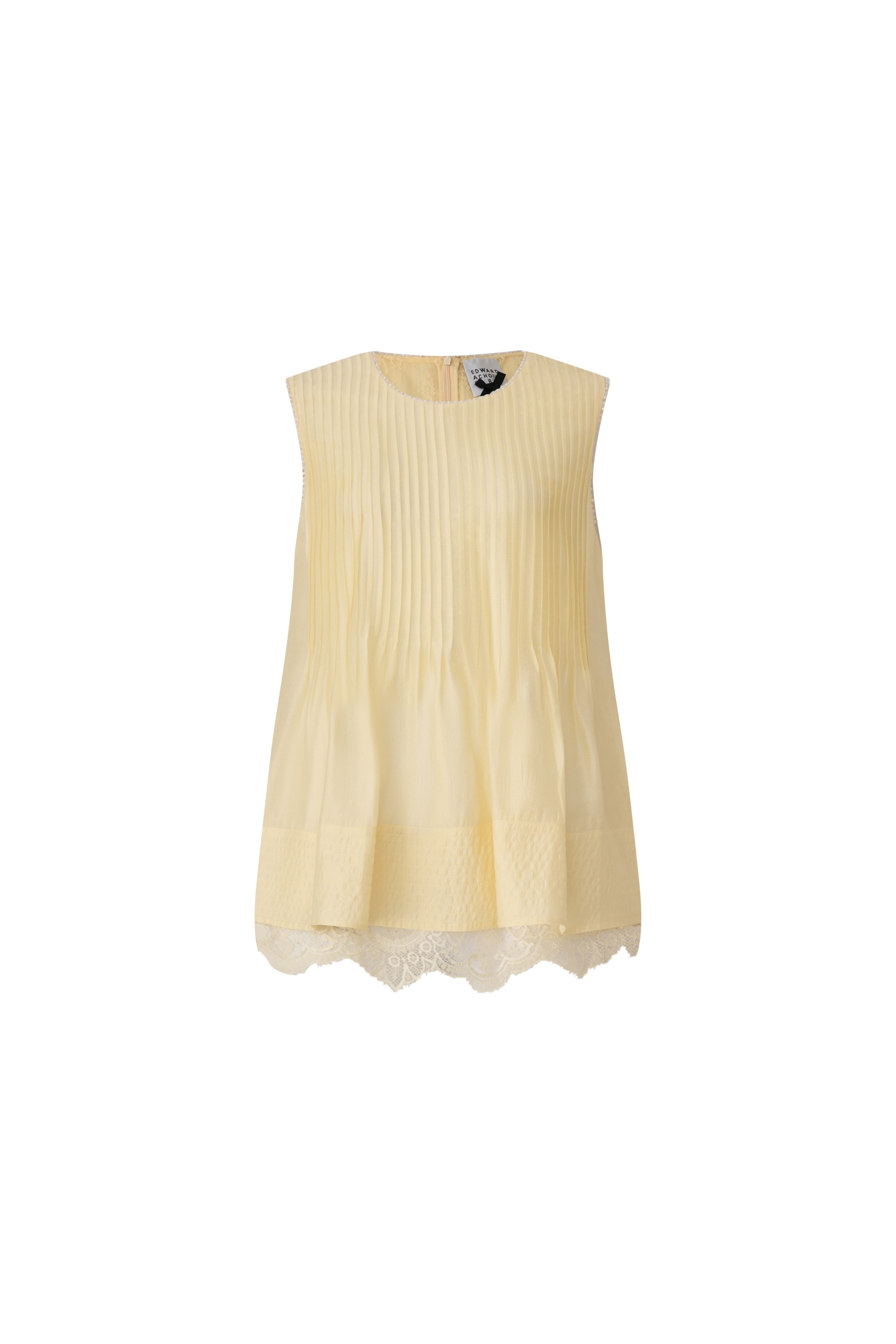 Front view of a pale yellow pleated sleeveless top with white lace hem by Edward Achour Paris.