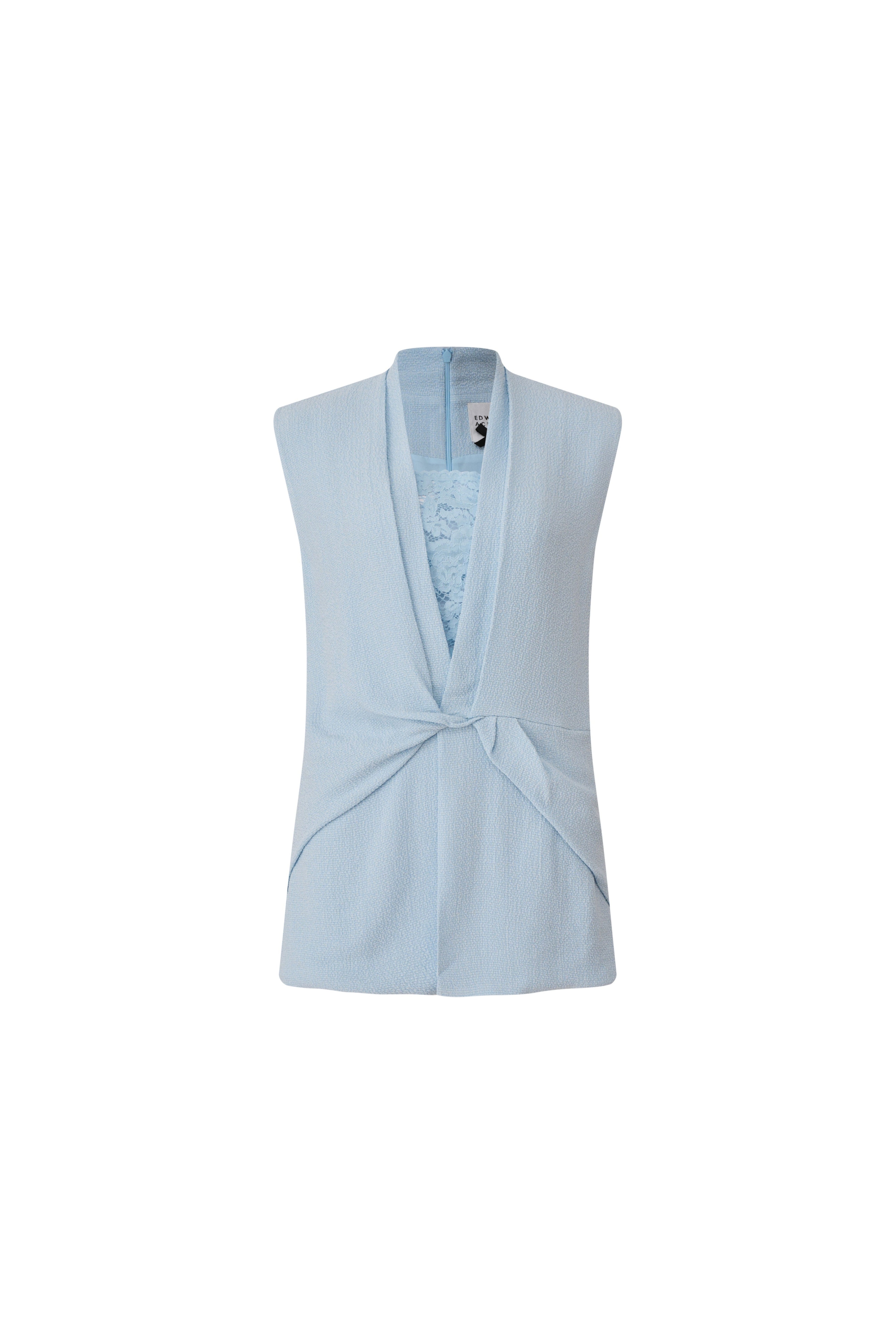 Front view of a light blue sleeveless tweed vest with a twist at the waist by Edward Achour Paris.