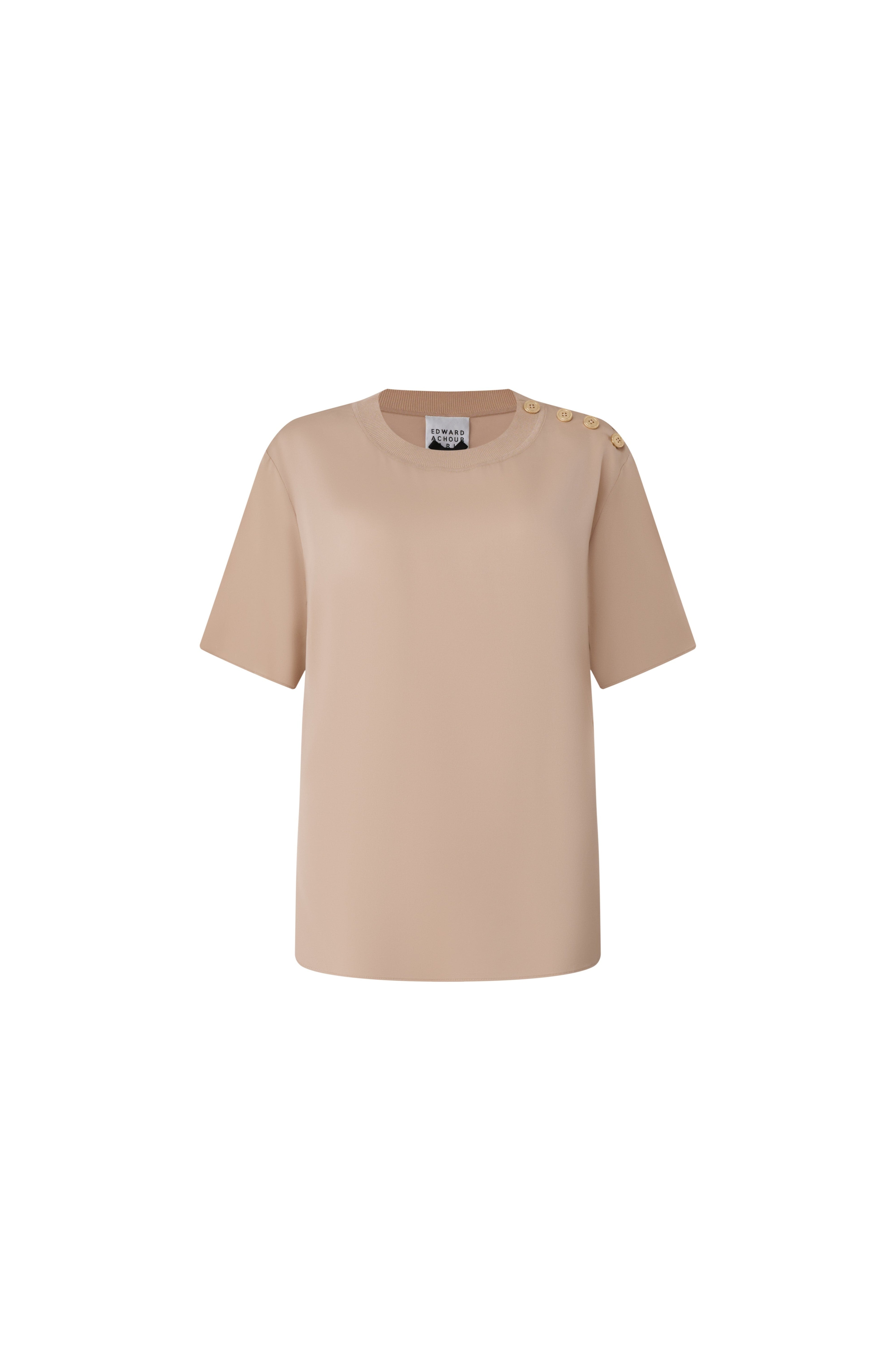 Front view of a camel-colored short-sleeve silk knit top with gold buttons on the shoulder.