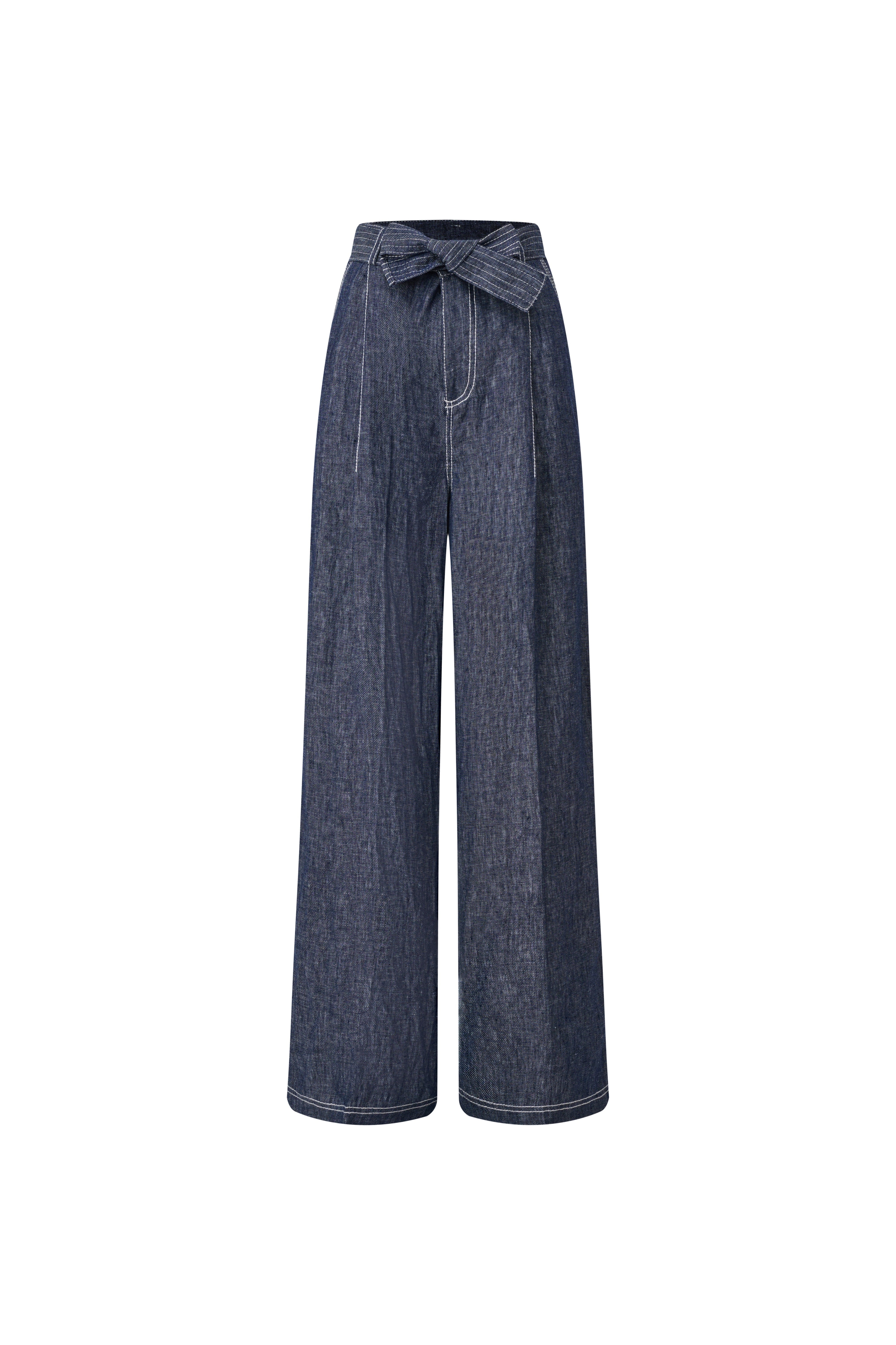 Front view of Edward Achour indigo wide-leg jeans with a matching denim tie-belt and white stitching.